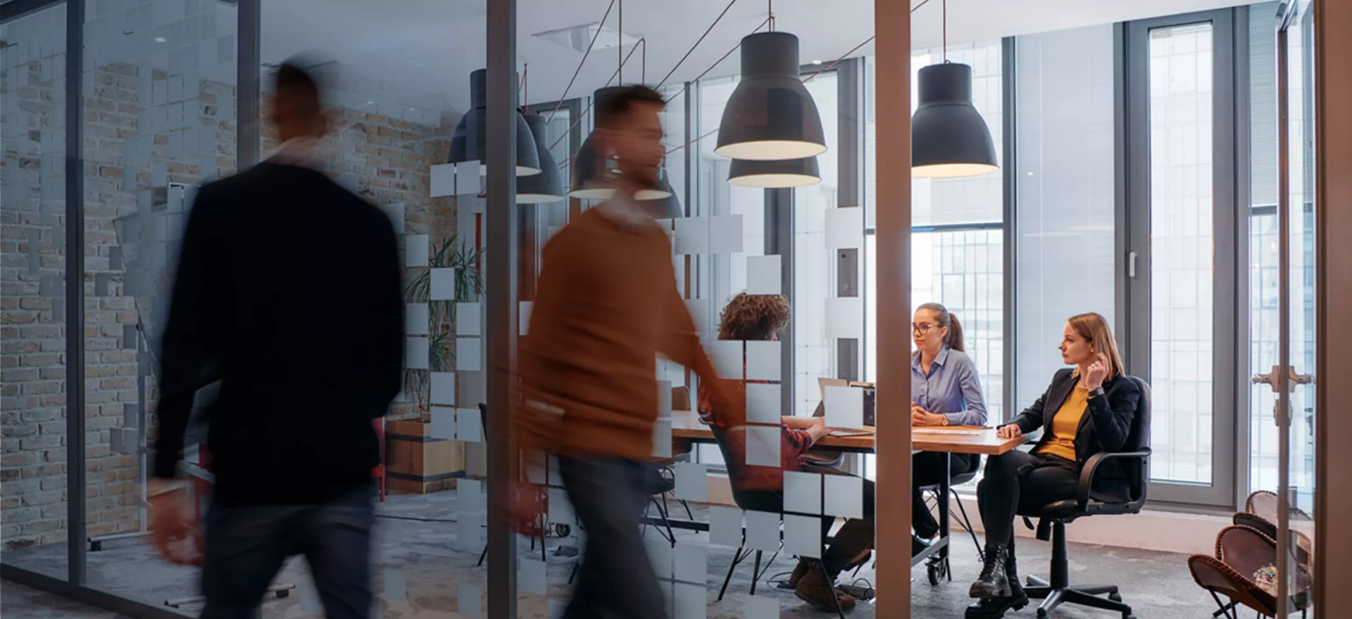 employees walking around office 