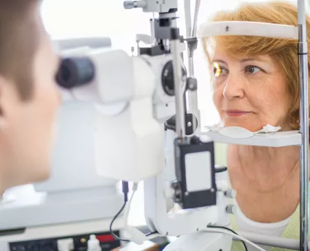 older woman at eye doctor