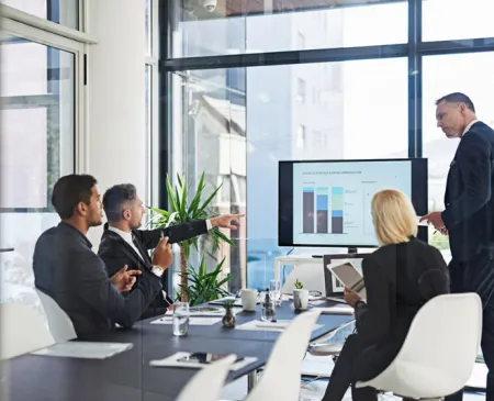 financial executives strategizing in meeting