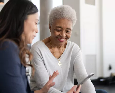 older woman reviewing plans
