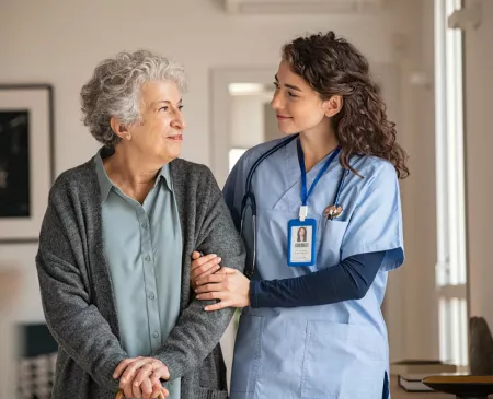 woman walking with nurse