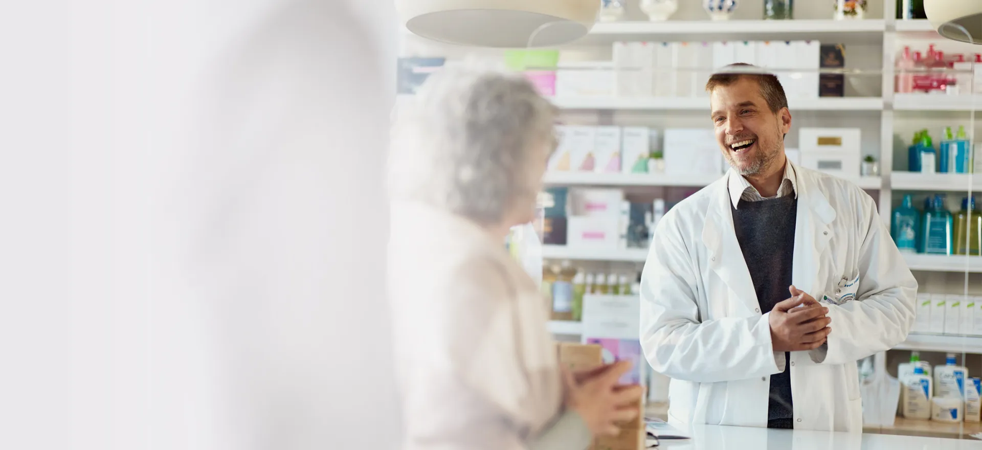 Pharmacist with customers
